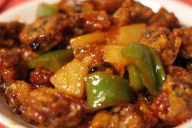Recette : Aigre-doux de porc aux fruits secs 